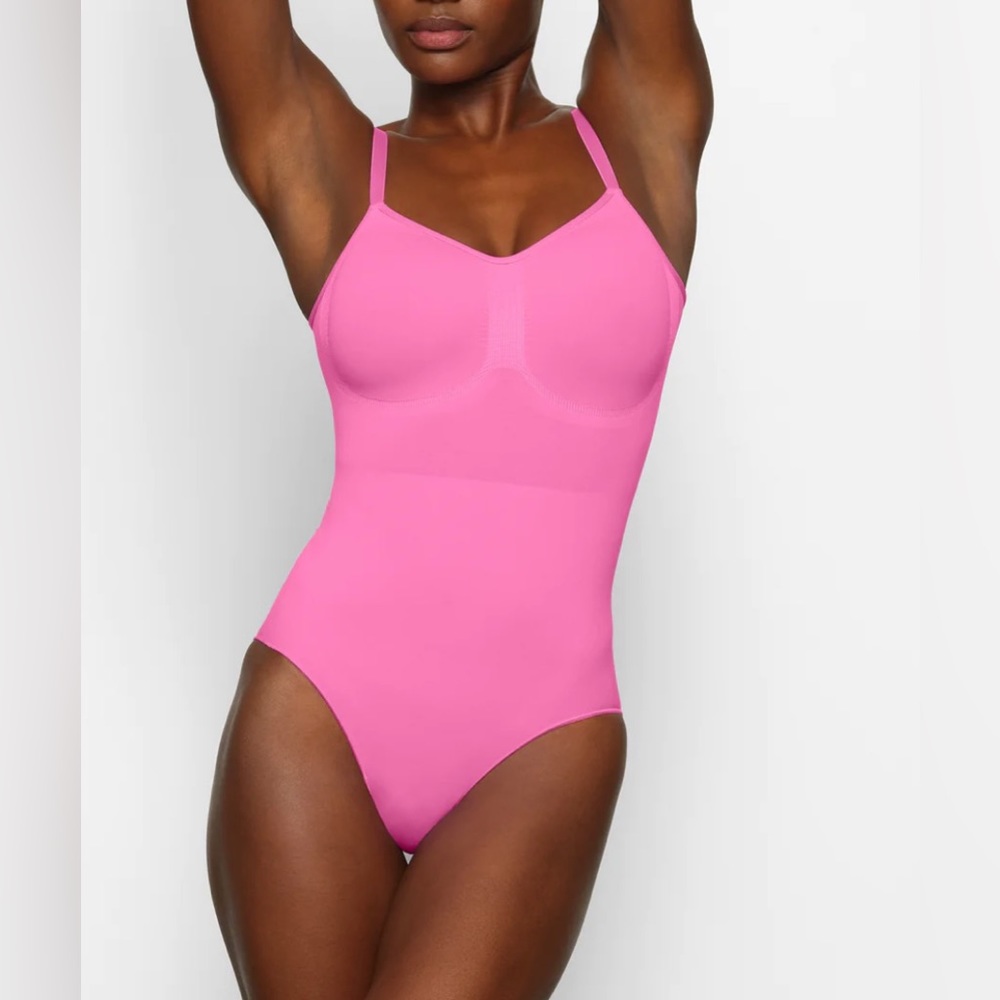 Super Rare Sold Out sculpting bodysuit W/Snaps. Brand New in box!